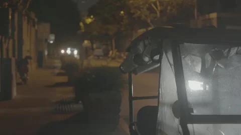 Covered Three Wheel Vehicle Parked on Beijing Street at Night Vidéo 340480721