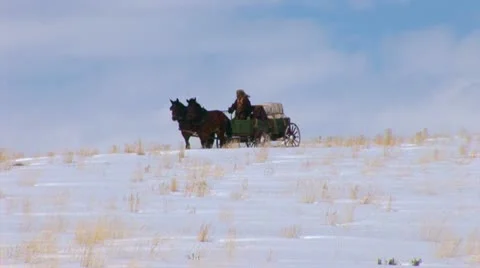 Covered Wagon in winter on western plains Video stock 11364130