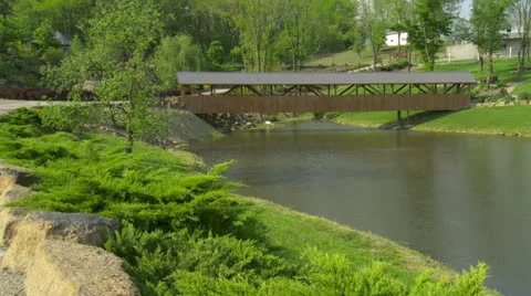 CoveredBridgeOnLake Stock Footage 24695813