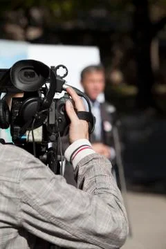 Covering an event with a video camera Stock Photos