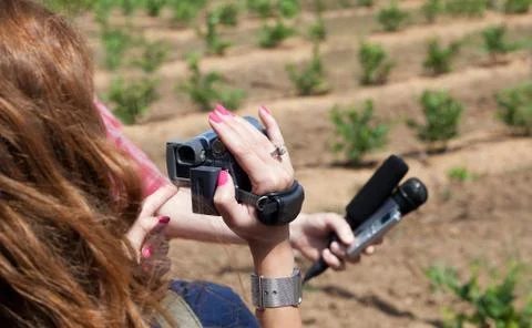 Covering an event with a video camera Stock Photos