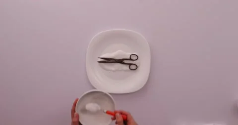 Covering scissors with mixture 1 스톡 동영상 132211012