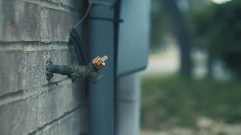 CoveringHoseSpigot Stock Footage 98998622