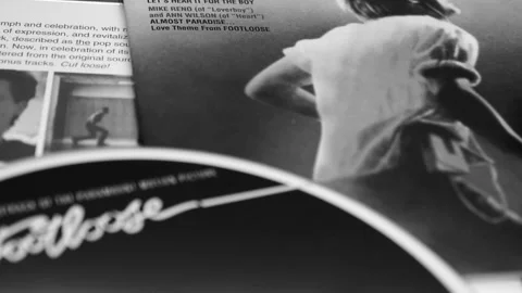 Covers and cd of the edition for the 15th anniversary of FOOTLOOSE Stock Footage 162498687
