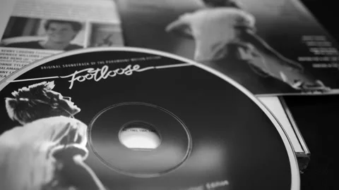 Covers and cd of the edition for the 15th anniversary of FOOTLOOSE. to 1984.. Stock Footage 250351368