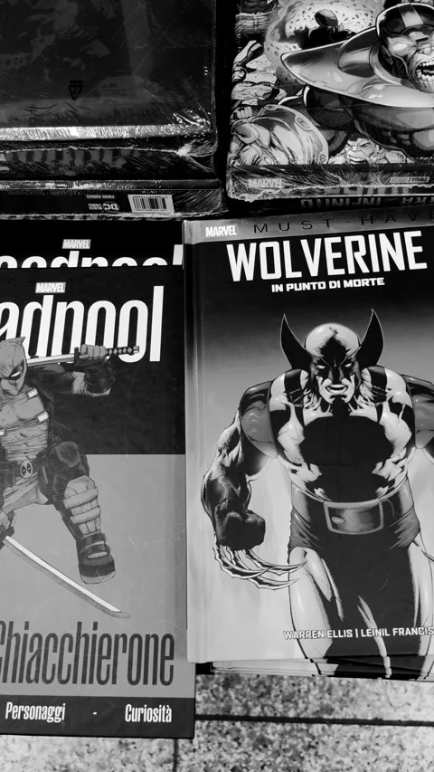 The covers of the books Deadpool and In the Point of Death. Wolverine Stock Footage 285957269