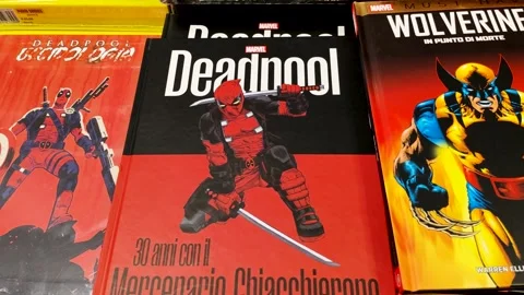 The covers of the books Deadpool and In the Point of Death. Wolverine Stock Footage 285957304