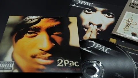 Covers of CDs by Tupac Shakur. also known as 2Pac and Makaveli Stock Footage 114510812