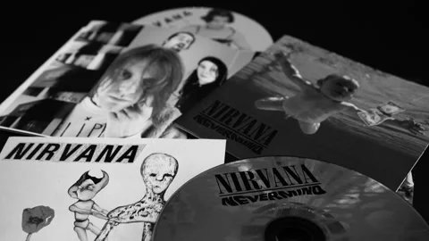 Covers of some iconic CDs of the American group, NIRVANA by Kurt Cobain Stock Footage 254201084