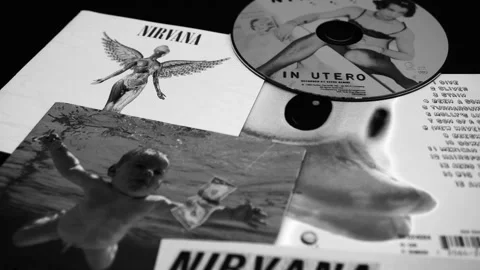 Covers of some iconic CDs of the American group, NIRVANA by Kurt Cobain Stock Footage 254201258
