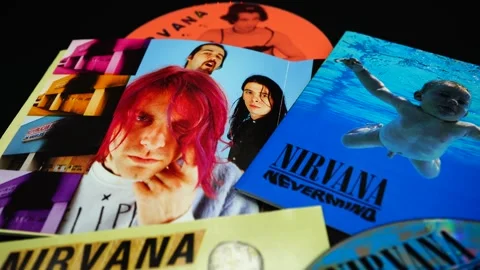 Covers of some iconic CDs of the American group, NIRVANA by Kurt Cobain Stock Footage 254202067