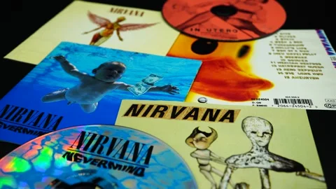Covers of some iconic CDs of the American group, NIRVANA by Kurt Cobain Stock Footage 254202080