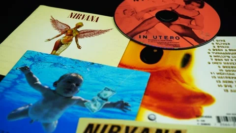 Covers of some iconic CDs of the American group, NIRVANA by Kurt Cobain Stock Footage 254202132