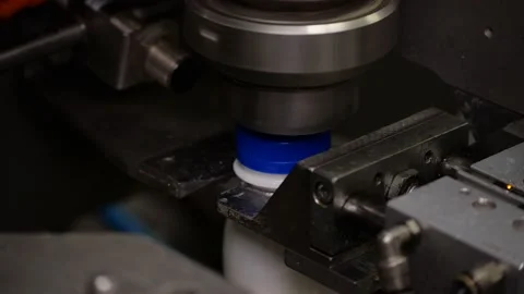The covers of the yorguts are twisted on the conveyor Stock Footage 170667938