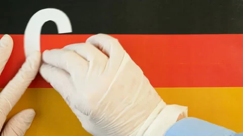 Covid - 19, 2019-nCoV virus concept. Word coronavirus from letters on Germany Stock Footage 126310341