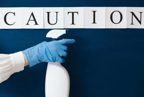 Covid-19 alert, text "Caution" Stock Photos