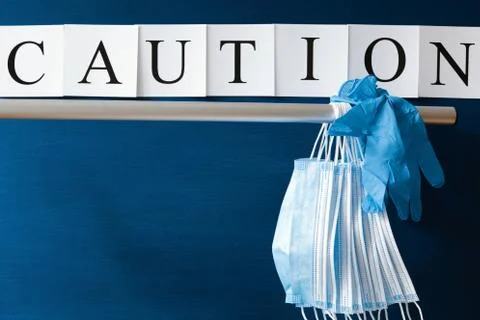 Covid-19 alert, text "Caution" Stock Photos