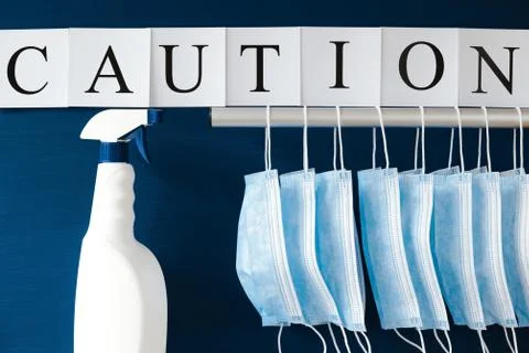 Covid-19 alert, text "Caution" Stock Photos