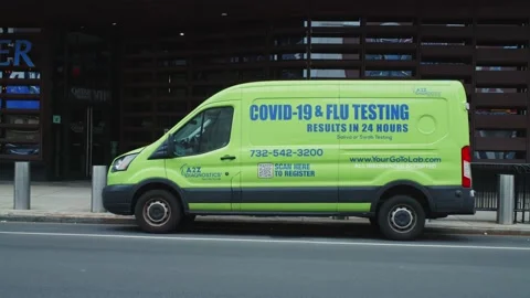 Covid-19 and Flu Testing Van outside Barclays Center, Brooklyn, NYC. Panning. Stock Footage 231266095