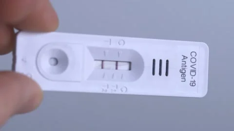 Covid-19 Antigen Test Showing Positivity - Up-Close Look Stock-Footage 169010656