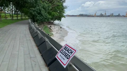 COVID-19 : Beach closed sign in Singapore amidst Circuit-Breaker lockdown Stock Footage