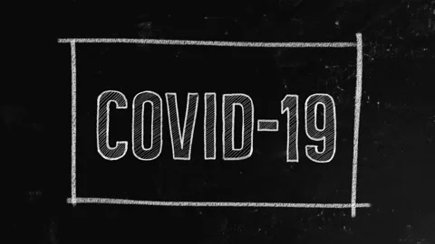 COVID-19 concept written on blackboard Stock Footage 146204396