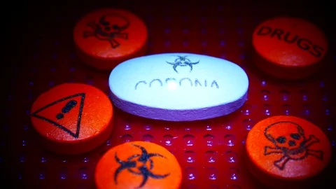 COVID-19 CORONA virus caption on pill cure medicine Stock Footage 124700271