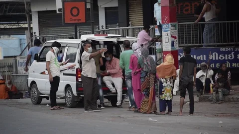 Covid 19 Corona Virus Lockdown Helping and feeding poor people. Stock Footage 129308706