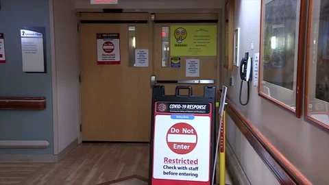 COVID-19 Do Not Enter Restricted Sign in Hospital Stock Footage 143729291