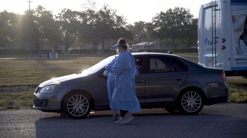 COVID-19 Drive through testing location Video stock 127117374