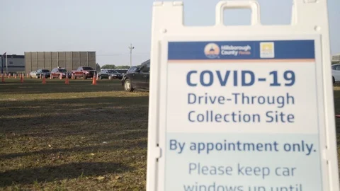 COVID-19 Drive through testing location Video stock 127117429