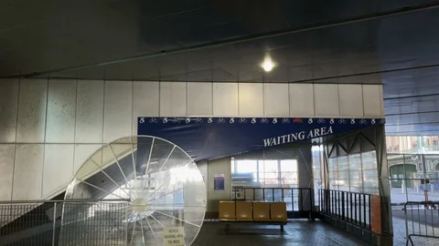 COVID-19, Empty  waiting area for Staten Island Ferry. Stockbeeldmateriaal 126988326