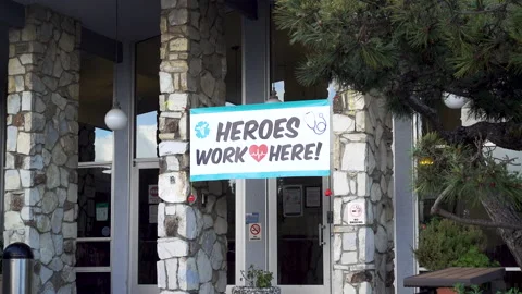 COVID 19 Heros Work Here Nursing Home Sign Stock Footage
