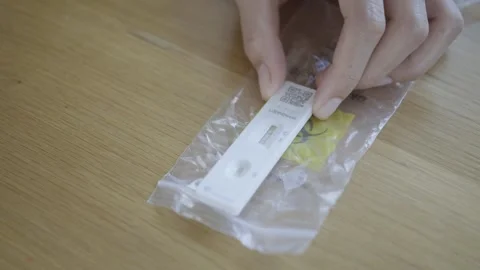 COVID-19 Home Test Kit Result Stock Footage 314902151