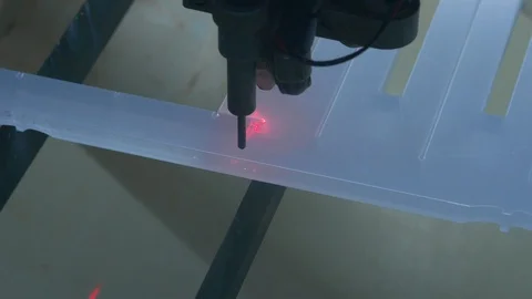 Covid 19 - laser machine cutting plexiglas to allow social distancing Stock-Footage 129393078