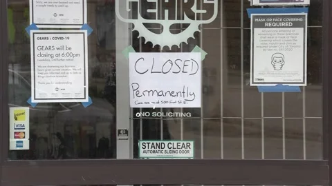 COVID 19 lockdown permanently closed  bicycle shop retail store in Toronto Stock Footage 151187927