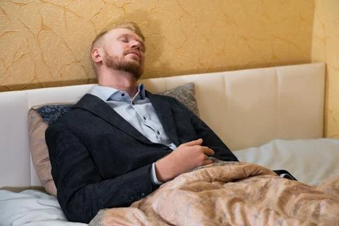 Covid-19 lockdown, work at home from bed Stock Photos