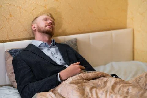 Covid-19 lockdown, work at home from bed Foto stock