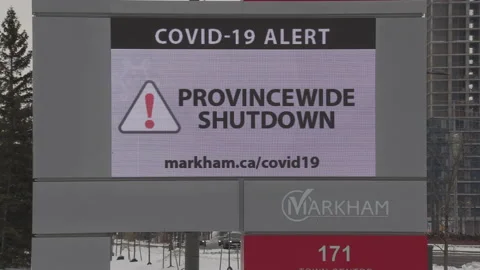 COVID 19 pandemic lockdown  warning sign near Toronto Stock Footage 145773122