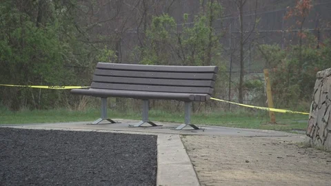 COVID-19 Playground Bench Caution Tape  :14 Stock-Footage 127760018