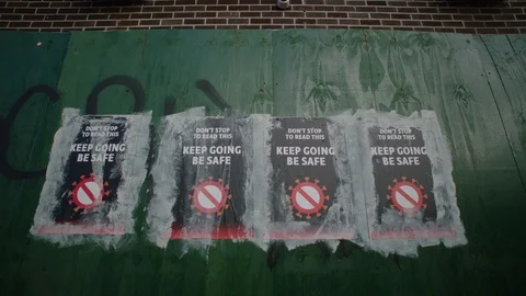 Covid-19 PSA Wheat Paste Poster Video stock 129695618