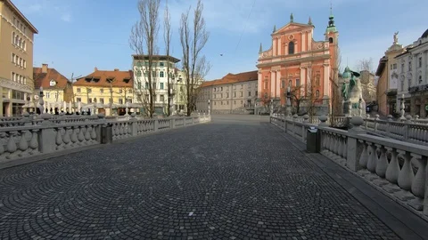 COVID 19 quarantine, empty main square and Triple Bridge on workday Stock Footage 128195151