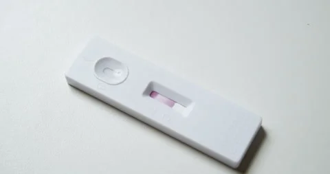 Covid-19 Rapid Antigen test kit process with drop solution liquid from Stock Footage 252657220