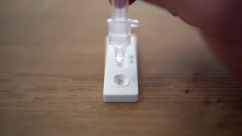 Covid 19 rapid self test drops close up Video stock 150564265