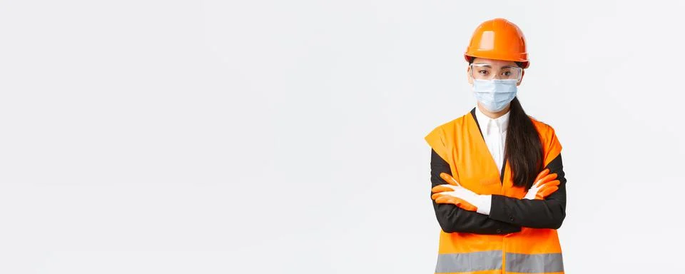 Covid-19 safety protocol at enterpise, construction and preventing virus concept Stock Photos