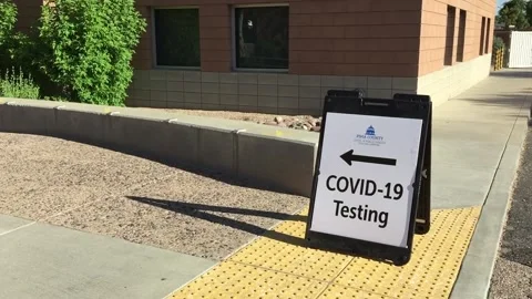 COVID-19 saliva testing curb side sign Stock Footage 136961188