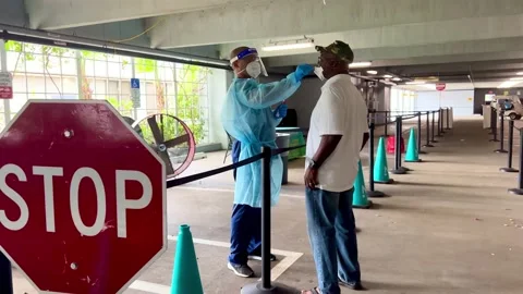 Covid-19 Sample being collected in Miami Dade Florida Stock Footage 205129531