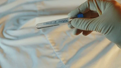 Covid 19 sample in test tube Stock Footage 128298937