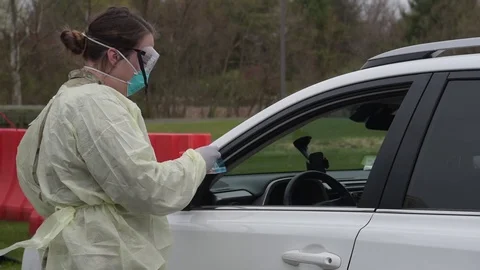 COVID-19 Screening Stock Footage 128974060