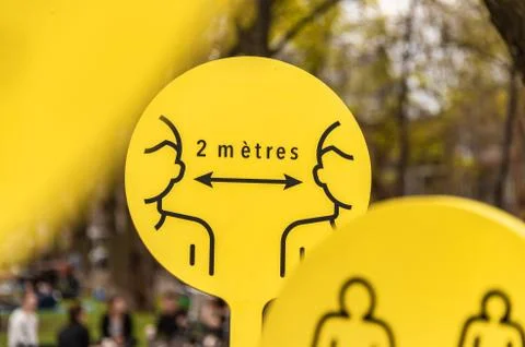 Covid-19 social distancing french sign warning people to stay 2 meters apart. Stock Photos